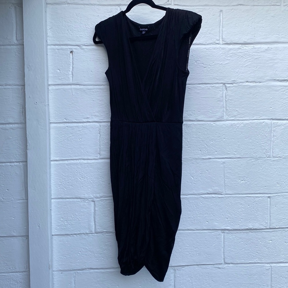 bebe | mini v neck black dress with mini shoulder pads | size M